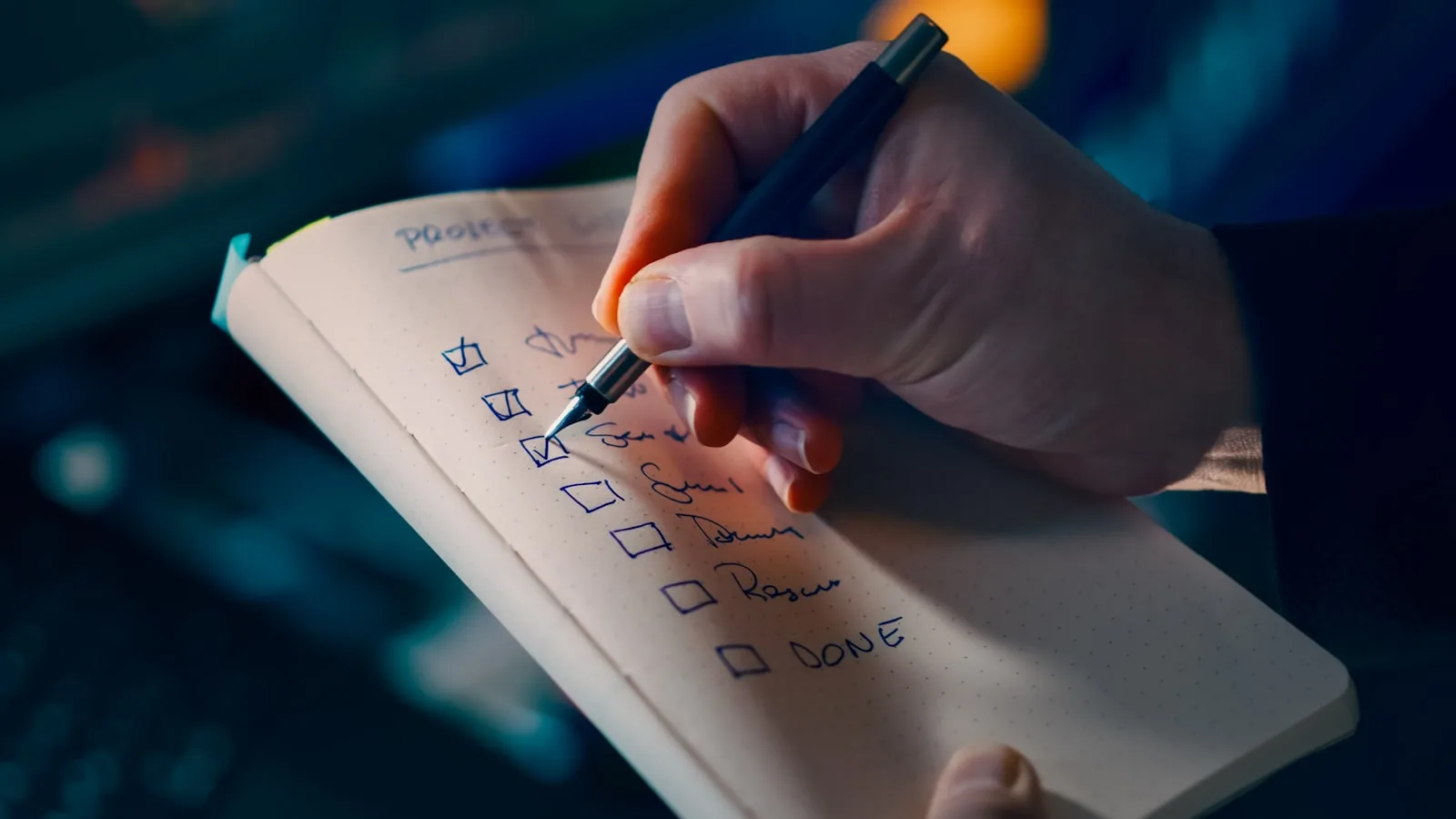 A hand ticking boxes on a handwritten project checklist by lamplight, representing a structured framework for evaluating AI receptionist vendors